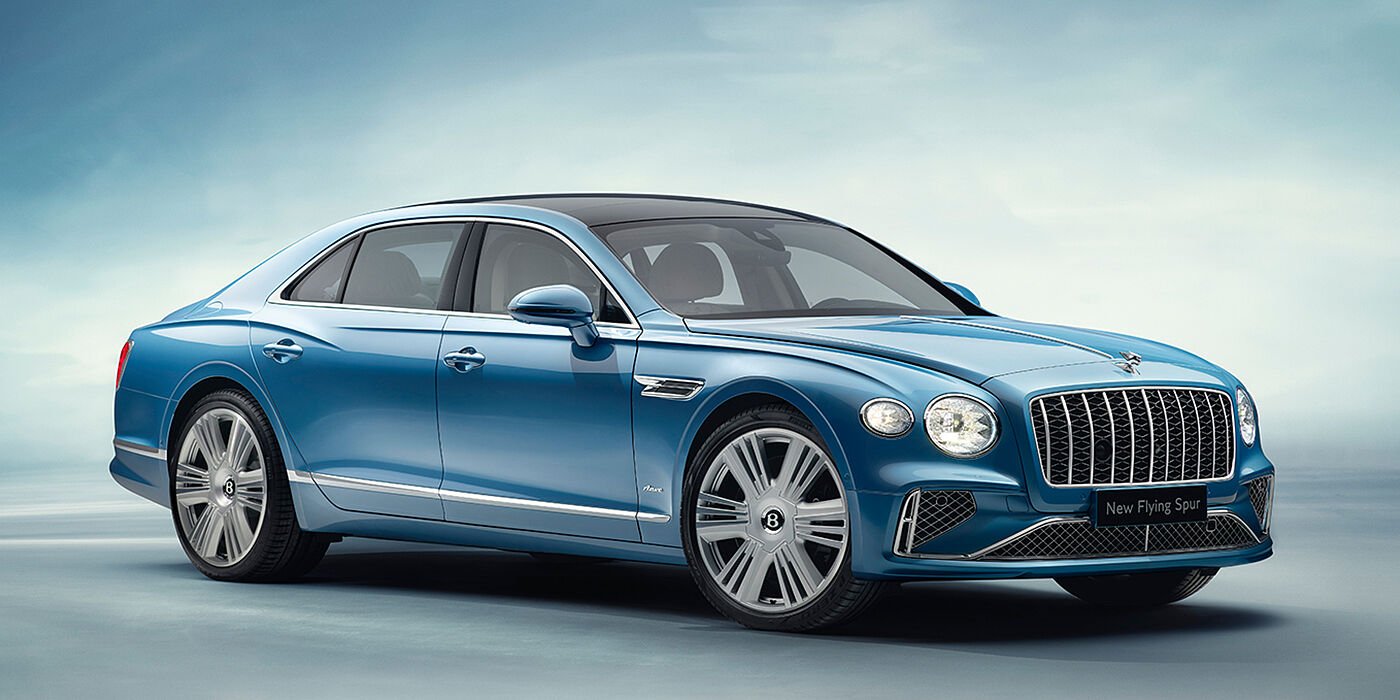 Bentley Muscat New Bentley Flying Spur Azure sedan front view in Light windsor blue by Mulliner paint with 22 inch Azure wheels and chrome exterior details