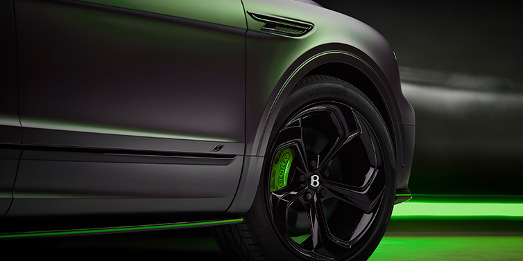 Bentley Muscat Bentley Bentayga S Black Edition SUV exterior wheel detail with Cyber Green brakes with Anthracite Satin paint